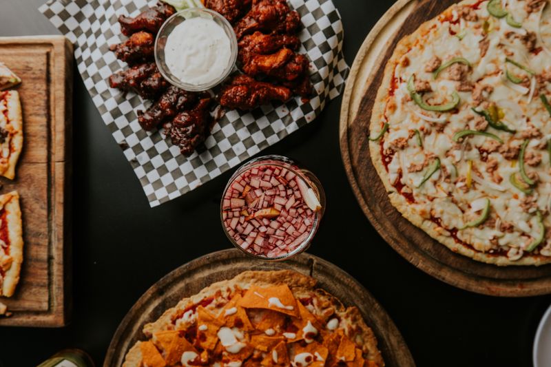 BBQ Chicken pizza with smoky sauce and caramelized onions