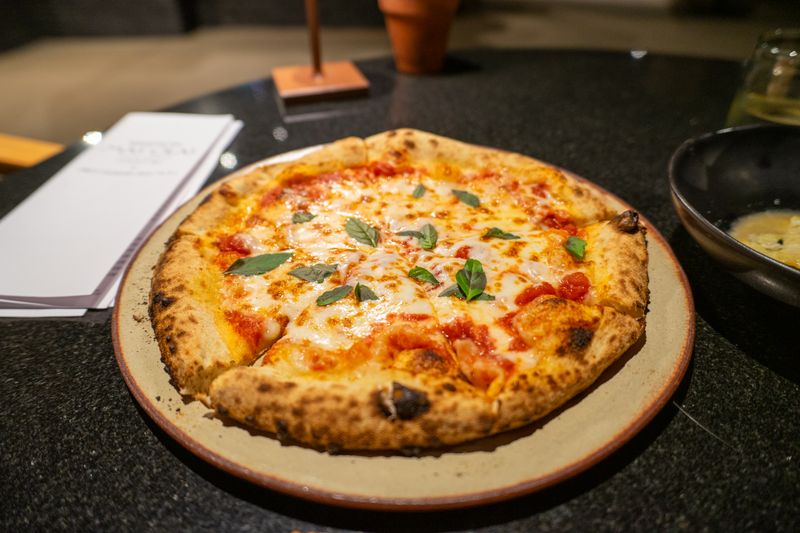 Pepperoni pizza with extra cheese and crispy edges